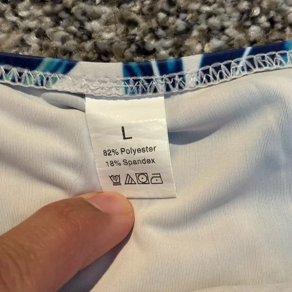 White swim bottoms with blue and green Leaf Print - Picture 3 of 5